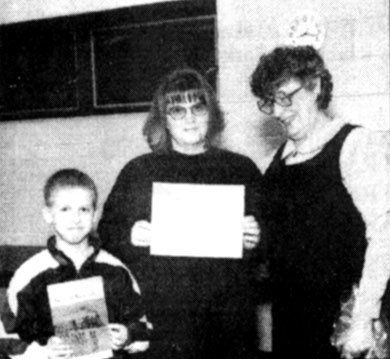 Paulette Donaldson receives Mayor's Award, with her son Michael at her side